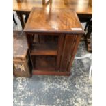 AN EDWARDIAN CHEQUER LINE INLAID MAHOGANY ROTARY BOOKCASE