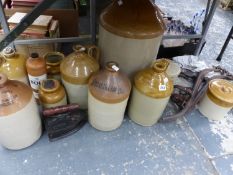 TWO TONE STONEWARE FLASKS, A PAIR OF HAMES, A CLOTHES IRON, ETC.
