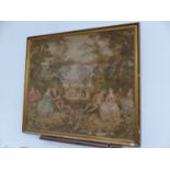 A MACHINE MADE TAPESTRY DEPICTING AN 18th C. GARDEN GATHERING, THE GILT FRAME. 140 x 155cms