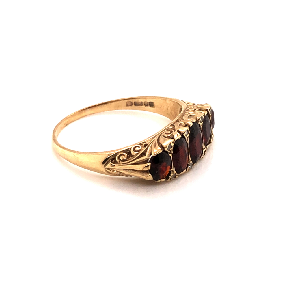 A VINTAGE GARNET AND DIAMOND GRADUATED CARVED HALF HOOP RING. DATED 1979, LONDON. FINGER SIZE Y. - Image 3 of 3
