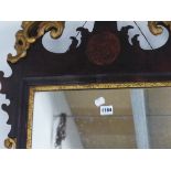 A GEORGE III MAHOGANY CUTWORK FRAMED RECTANGULAR MIRROR, THE GILT ROCOCO FOLIAGE AT THE TOP