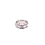 A DIAMOND SET OPEN WORK RING. STATED DIAMOND WEIGHT INSIDE OF SHANK 0.66cts. UNHALLMARKED,