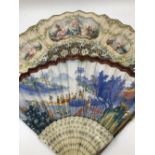TWO 18th/19th C. FANS, THAT ON MOTHER OF PEARL STICKS PAINTED WITH THREE COUNTRYSIDE VIGNETTES ON