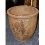 A LIBERTY AND CO. TERRACOTTA FLOWER POT, THE EXTERIOR WITH FOUR RECTANGULAR RELIEF PANELS OF