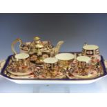 A CROWN DERBY PATTERN 2451 IMARI PALETTE CABARET SET, DATE SYMBOLS MAINLY 1895/6, COMPRISING: A