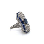 A SAPPHIRE AND DIAMOND COCKTAIL RING. UNHALLMARKED,STAMPED PLAT, ASSESSED AS PLATINUM. FINGER SIZE