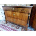 A 19th C. BIEDERMEIER SATIN WOOD CHEST OF THREE GRADED LONG DRAWERS BETWEEN EBONISED COLUMNS TOPPED