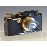 A LEATHER CASED LEICA III CAMERA No. 144692 WITH SUMMAR 1=5CM 1:2 AND TRINOL ANASTIGMATIC 105MM f/