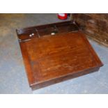 A MAHOGANY TABLE TOP WRITING DESK WITH A SLOPING LID OVER A COMPARTMENT. W 73 x D 66 x H 25cms.