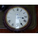 AN EARLY 19th CENTURY CARVED MAHOGANY WALL CLOCK WITH SINGLE FUSEE MOVEMENT, SIGNED INDISTINCTLY