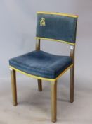 AN ELIZABETH II BLUE VELVET UPHOLSTERED OAK CORONATION CHAIR NUMBERED 8 ON THE TOP RAIL TOGETHER