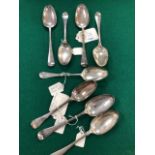 EIGHT 18th CENTURY SILVER HANOVERIAN PATTERN TABLE SPOONS BY VARIOUS MAKERS AND OF VARIOUS LONDON