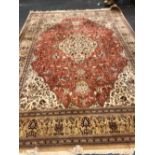 A PERSIAN TABRIZ CARPET. 380 X 260cms