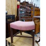 A PAIR OF GEORGE III COUNTRY OAK AND ELM LADDER BACK CHAIRS.