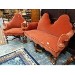 A WILLIAM AND MARY STYLE WALNUT FRAMED DOUBLE CHAIR BACK SETTEE AND A MATCHING ARM CHAIR.