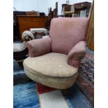 A VICTORIAN LARGE DEEP SEAT ARMCHAIR.