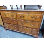 AN 18th C. OAK MULE CHEST, THE COFFER TOP OVER TWO BANKS OF THREE DRAWER FRONTS, FOUR OF THE DRAWERS