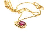 AN 18ct HALLMARKED GOLD RUBY AND DIAMOND CLUSTER PENDANT WITH DIAMOND SET BALE, SUSPENDED ON AN 18ct