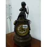 A 19th CENTURY FRENCH BRONZE CASED SMALL MANTLE CLOCK WITH PUTTI SURMOUNT.