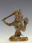 A NEPALESE COPPER FIGURE OF MANJUSHRI SEATED CROSS LEGGED WITH A FLAME TIPPED SWORD IN HIS RIGHT