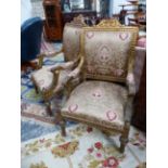 A PAIR OF FRENCH STYLE GILT SHOW FRAME ARMCHAIRS
