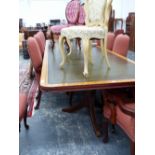 A CONTEMPORARY SATIN WOOD CROSS BANDED MAHOGANY BOARD ROOM TABLE SUPPORTED ON FOUR COLUMNS EACH WITH