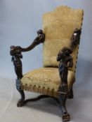 AN ANTIQUE ITALIAN WALNUT THRONE, THE ARMS WITH FIGURAL SUPPORTS AND WITH PUTTI RECLINING CLOSE TO