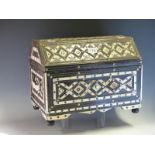 A MIDDLE EASTERN BONE INLAID TWO HANDLED CASKET, THE HINGED LID AND SIDES INLAID WITH BANDS OF
