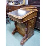 A VICTORIAN WALNUT DAVENPORT DESK