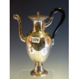 A FRENCH SILVER COFFEE POT AND HINGED COVER, DISCHARGE MARKS, THE BALUSTER SHAPE WITH EBONY HANDLE