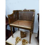 AN ANTIQUE GILT WOOD FRAMED CANE SEAT AND BACK, DRESSING STOOL/CHAIR