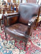 A 19th CENTURY LEATHER UPHOLSTERED LIBRARY DESK ARMCHAIR WITH MAHOGANY SHOW FRAME.