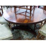 AN WILLIAM IV ROSEWOOD BREAKFAST TABLE ON CARVED COLUMN SUPPORTS AND A PLATFORM BASE. H 68 X