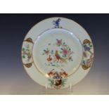 A MID 18th C. CHINESE ARMORIAL PLATE WITH A CREST ABOVE A CENTRAL PAIR OF PHEASANTS AND THE ARMORIAL