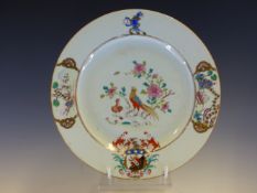 A MID 18th C. CHINESE ARMORIAL PLATE WITH A CREST ABOVE A CENTRAL PAIR OF PHEASANTS AND THE ARMORIAL