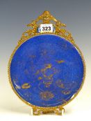A CHINESE POWDER BLUE DISH GILT WITH VASES AND MOUNTED IN EUROPEAN GILT METAL WITH AMORINI