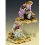 A PAIR OF ANTIQUEMEISSEN FIGURES BOTH ON ONE KNEE PICKING FLOWERS FROM THE ROCAILLE EDGED SQUARE