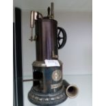 A VINTAGE TIN PLATE HOT AIR ENGINE