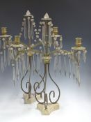 A PAIR OF 19th C. BRASS TWO LIGHT CANDELABRA, THE ARMS AND DRIP PANS HUNG WITH TORPEDO DROPS,