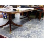 A GEORGIAN STYLE YEW WOOD AND LEATHER INLAID TWIN PILLAR BOARDROOM / DINING TABLE. H 77 X W 305 X