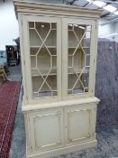 A PAINTED GLAZED BOOKCASE