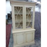 A PAINTED GLAZED BOOKCASE