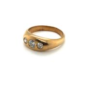 A VINTAGE OLD CUT GRADUATED THREE STONE DIAMOND GYPSY RING. FINGER SIZE T. WEIGHT 8.4grms.