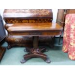 AN EARLY VICTORIAN ROSEWOOD FOLD OVER CARD TABLE