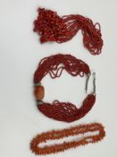 A VINTAGE MULTI STRAND CORAL STATEMENT NECKLACE. LENGTH APPROX. 48.5cm. TOGETHER WITH A BRANCH CORAL