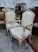 A SET OF FOUR FRENCH STYLE PAINTED ARMCHAIRS