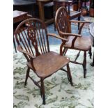 TWO 19th CENTURY WINDSOR WHEEL BACK ARM CHAIRS.