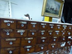 A 19th C. MAHOGANY APOTHECARYS CHEST OF NINE BANKS OF TWO DRAWERS OVER SIX BANKS OF TWO BROADER