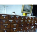 A 19th C. MAHOGANY APOTHECARYS CHEST OF NINE BANKS OF TWO DRAWERS OVER SIX BANKS OF TWO BROADER