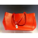 A ASPINAL OF LONDON RED LEATHER TOTE BAG. W 46 H 27 cms.